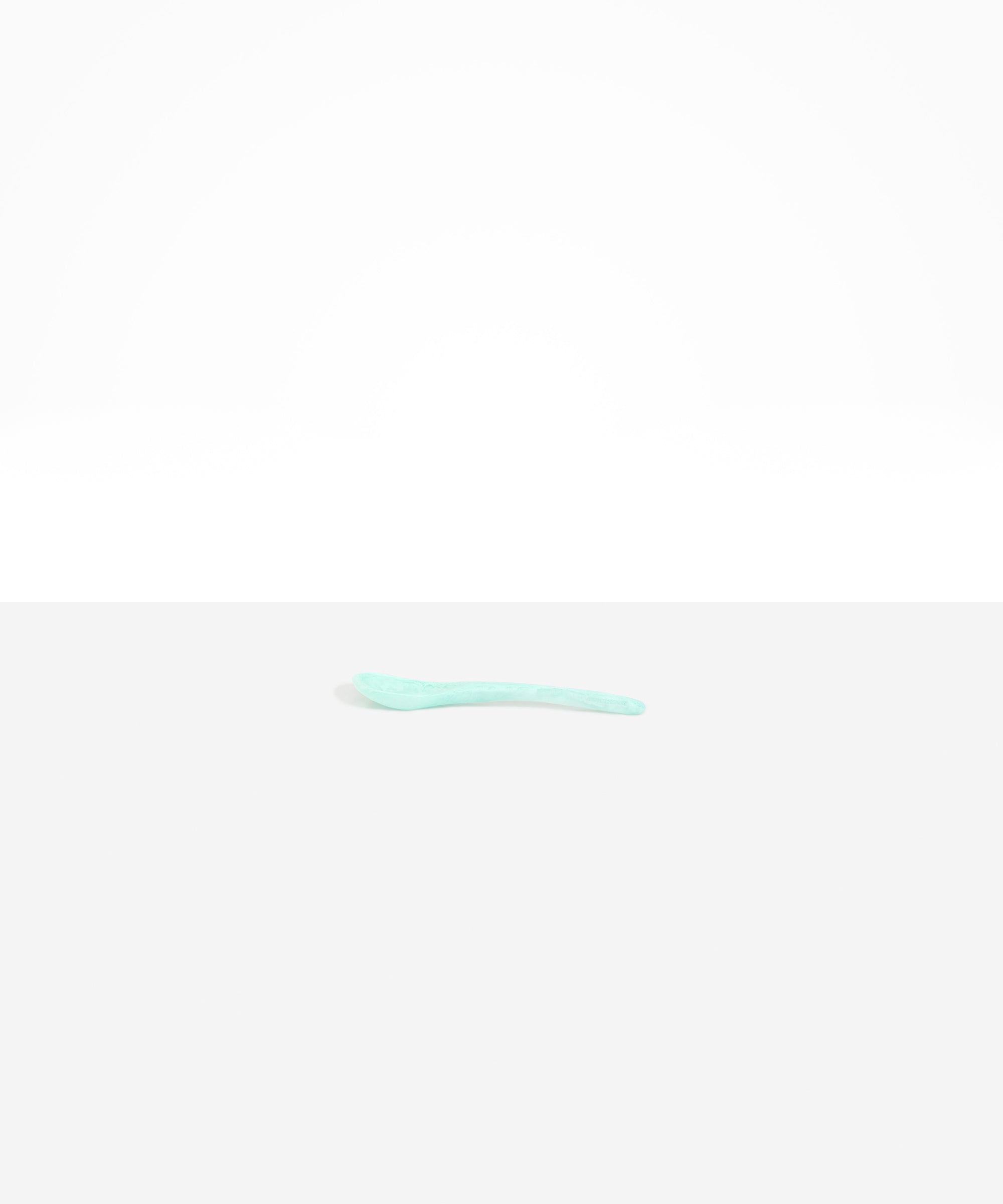Dinosaur Designs Medium Shell Spoon in Mint — handcrafted marbled mint blue resin spoon with slender tapered handle