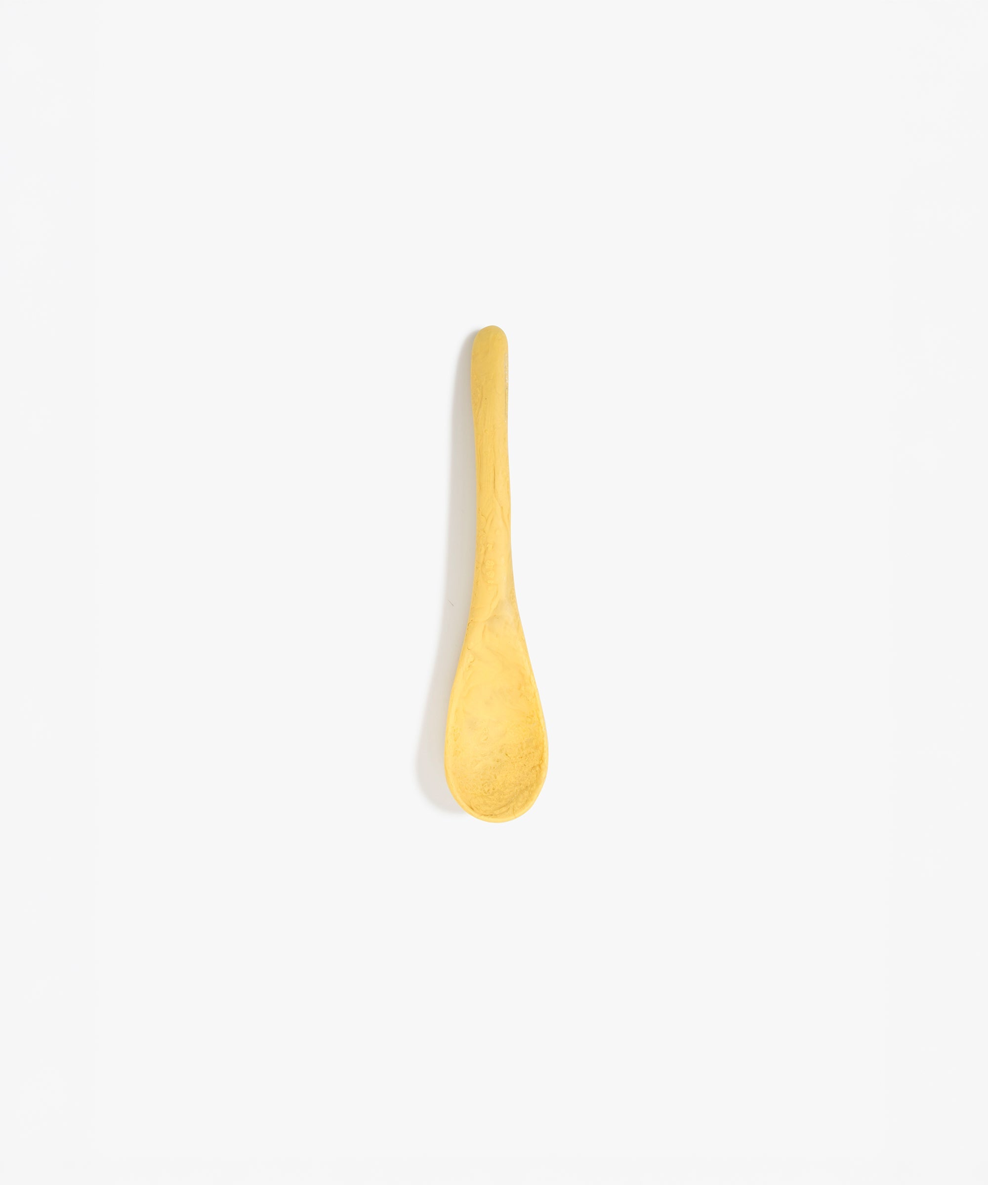 Dinosaur Designs Medium Shell Spoon in Pollen — handcrafted marbled yellow resin spoon with slender tapered handle
