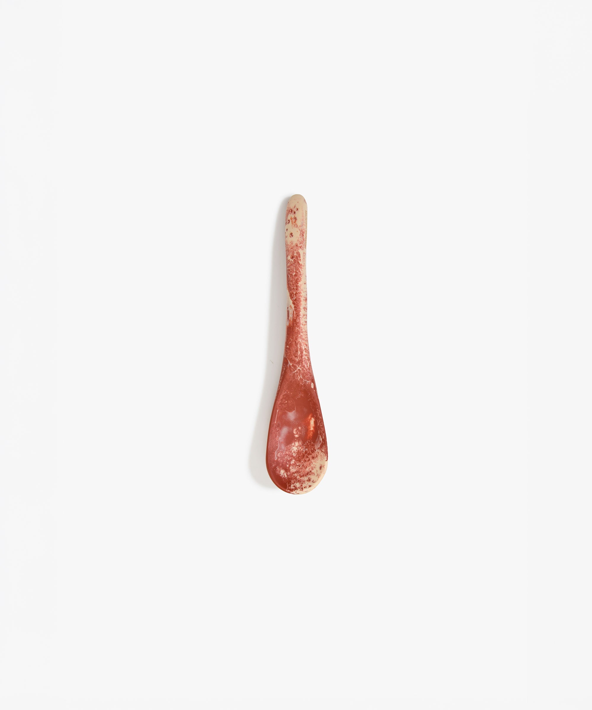 Dinosaur Designs Medium Shell Spoon in Rust — handcrafted marbled terracotta red and cream resin spoon with slender tapered handle