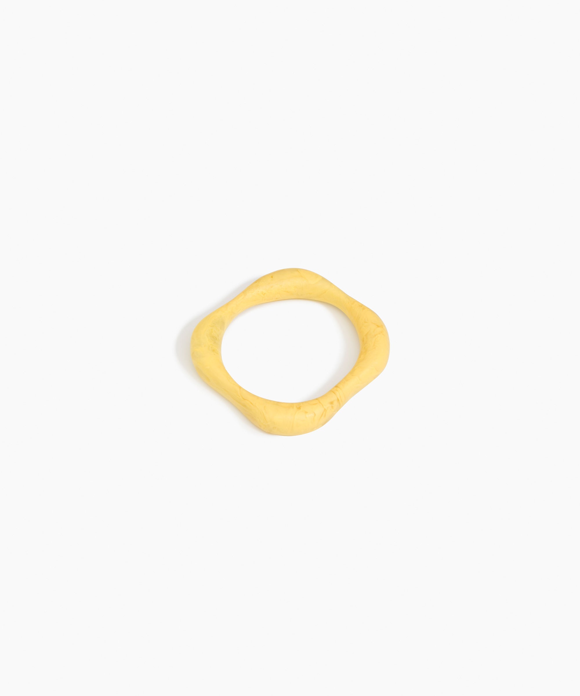 Dinosaur Designs Petal Bangle in Pollen — handmade marbled yellow resin bangle with slim undulating organic form