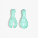 Dinosaur Designs Rock Servers in Mint — handcrafted marbled mint blue resin salad server set with rounded bulb handles, fork and spoon.