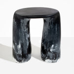 Dinosaur Designs Rock Tower Table in Black Marble — handcrafted marbled black and white resin side table with oval top and two chunky rounded legs