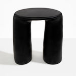 Dinosaur Designs Rock Tower Table in Black — handcrafted black resin side table with oval top and two chunky rounded legs