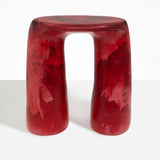 Dinosaur Designs Rock Tower Table in Cranberry — handcrafted marbled red resin side table with oval top and chunky rounded legs