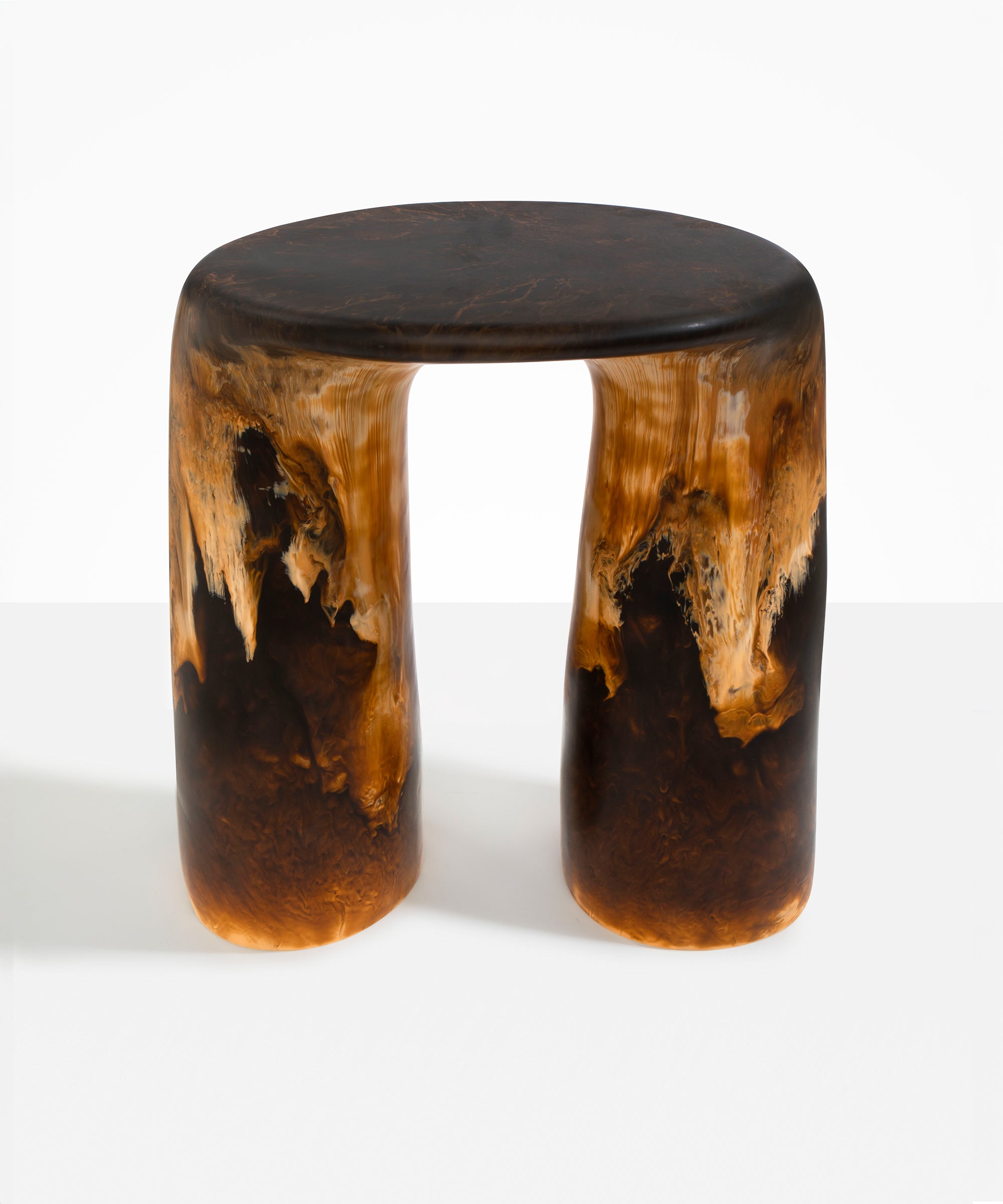Dinosaur Designs Rock Tower Table in Dark Horn — handcrafted marbled brown, black and gold resin side table with oval top and two chunky rounded legs