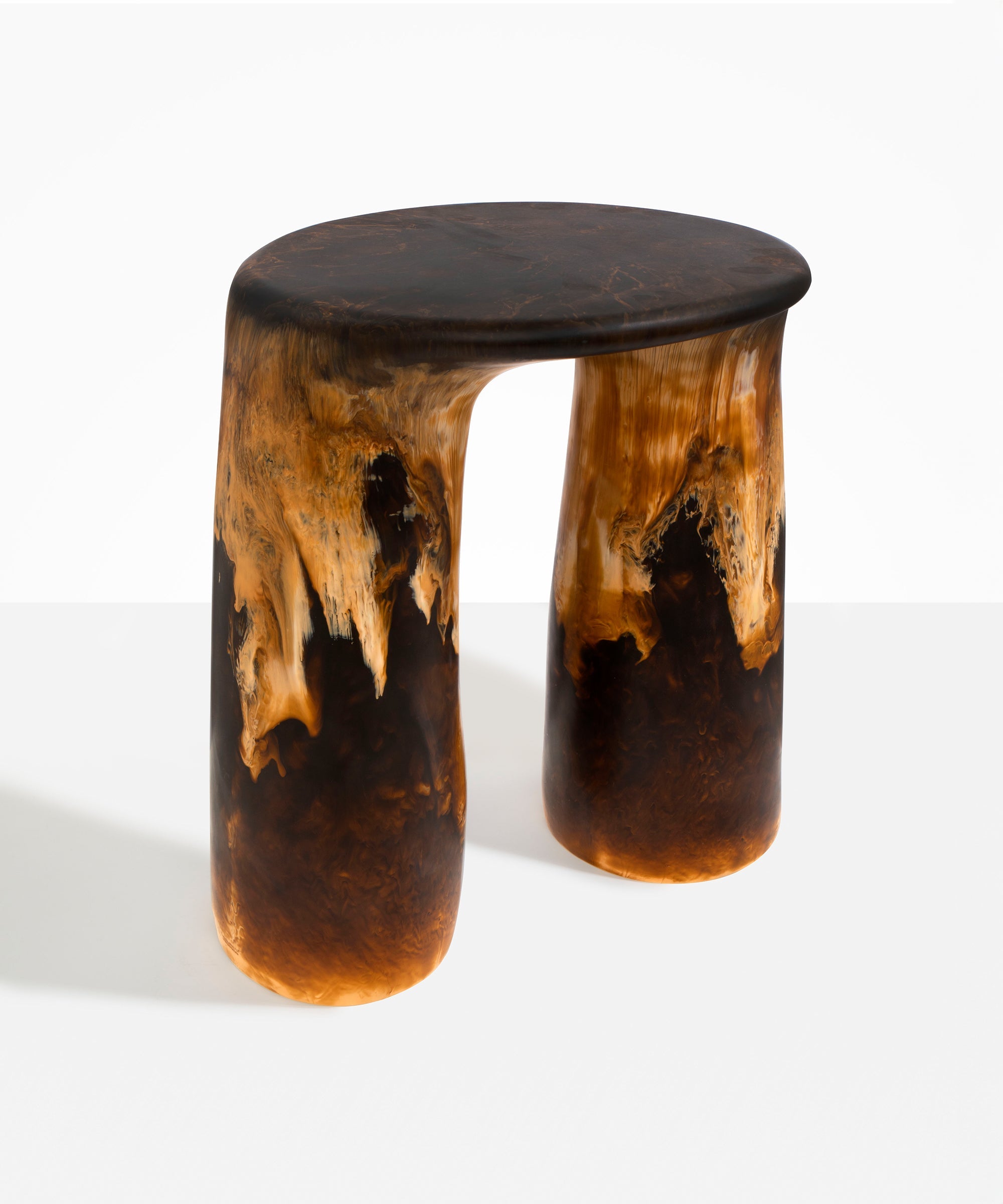 Dinosaur Designs Rock Tower Table in Dark Horn — handcrafted marbled brown, black and gold resin side table with oval top and two chunky rounded legs