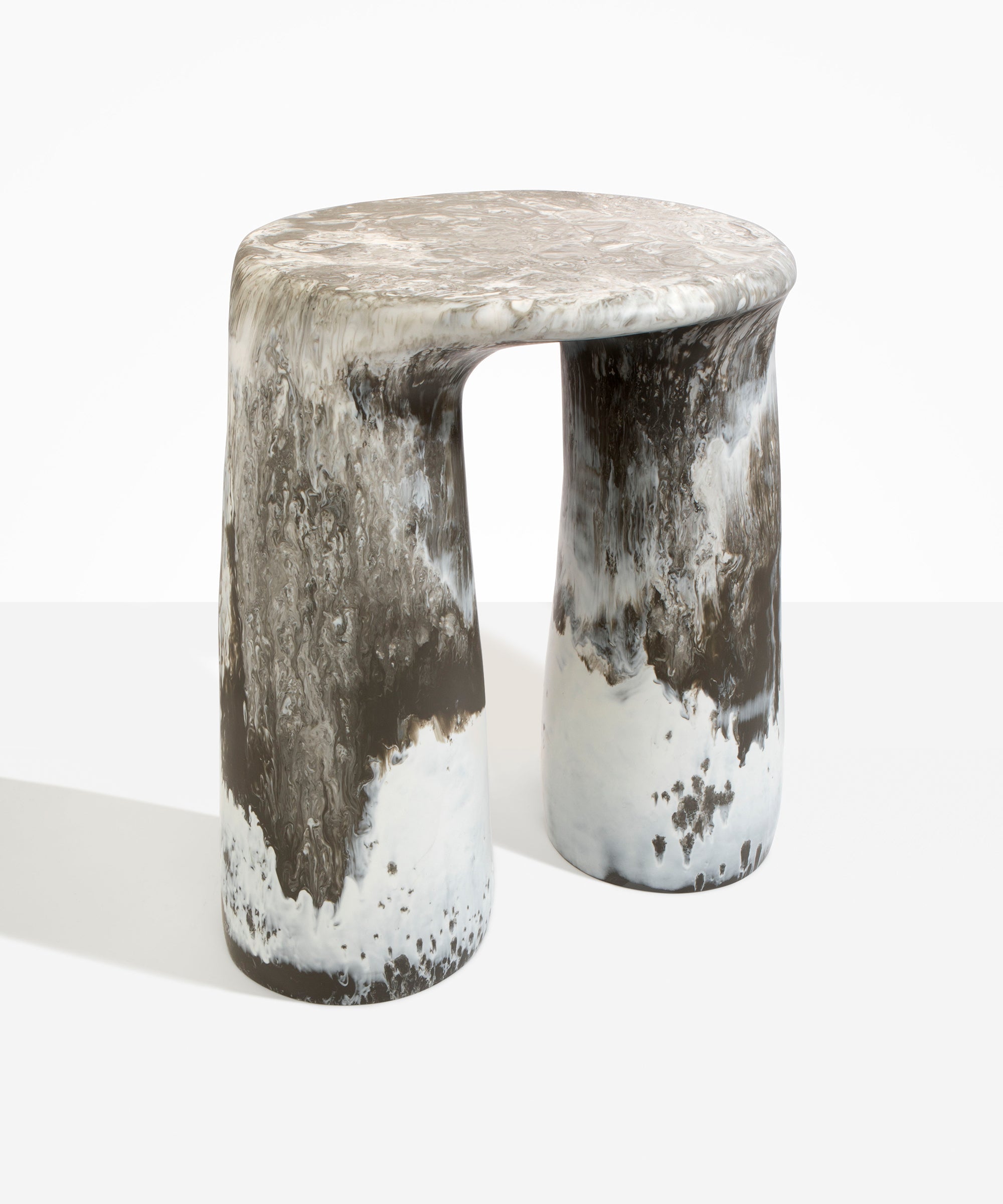 Dinosaur Designs Rock Tower Table in Granite — handcrafted marbled grey and white resin side table with oval top and two chunky rounded legs..