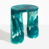 Dinosaur Designs Rock Tower Table in Lagoon — handcrafted marbled blue and cream resin side table with oval top and two chunky rounded legs