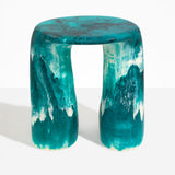 Dinosaur Designs Rock Tower Table in Lagoon — handcrafted marbled blue and cream resin side table with oval top and two chunky rounded legs