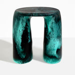 Dinosaur Designs Rock Tower Table in Lichen — handcrafted marbled teal and black resin side table with oval top and two chunky rounded legs