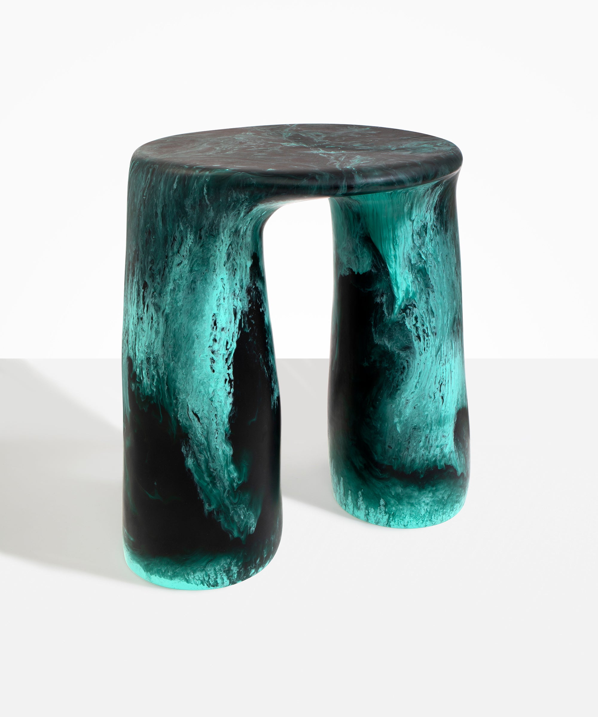 Dinosaur Designs Rock Tower Table in Lichen — handcrafted marbled teal and black resin side table with oval top and two chunky rounded legs