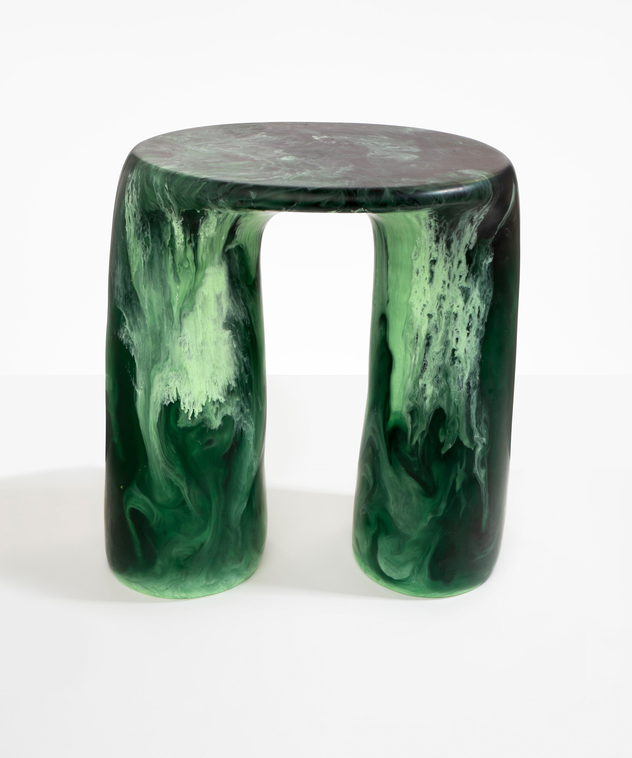 Dinosaur Designs Rock Tower Table in Moss — handcrafted marbled green resin side table with oval top and two chunky rounded legs