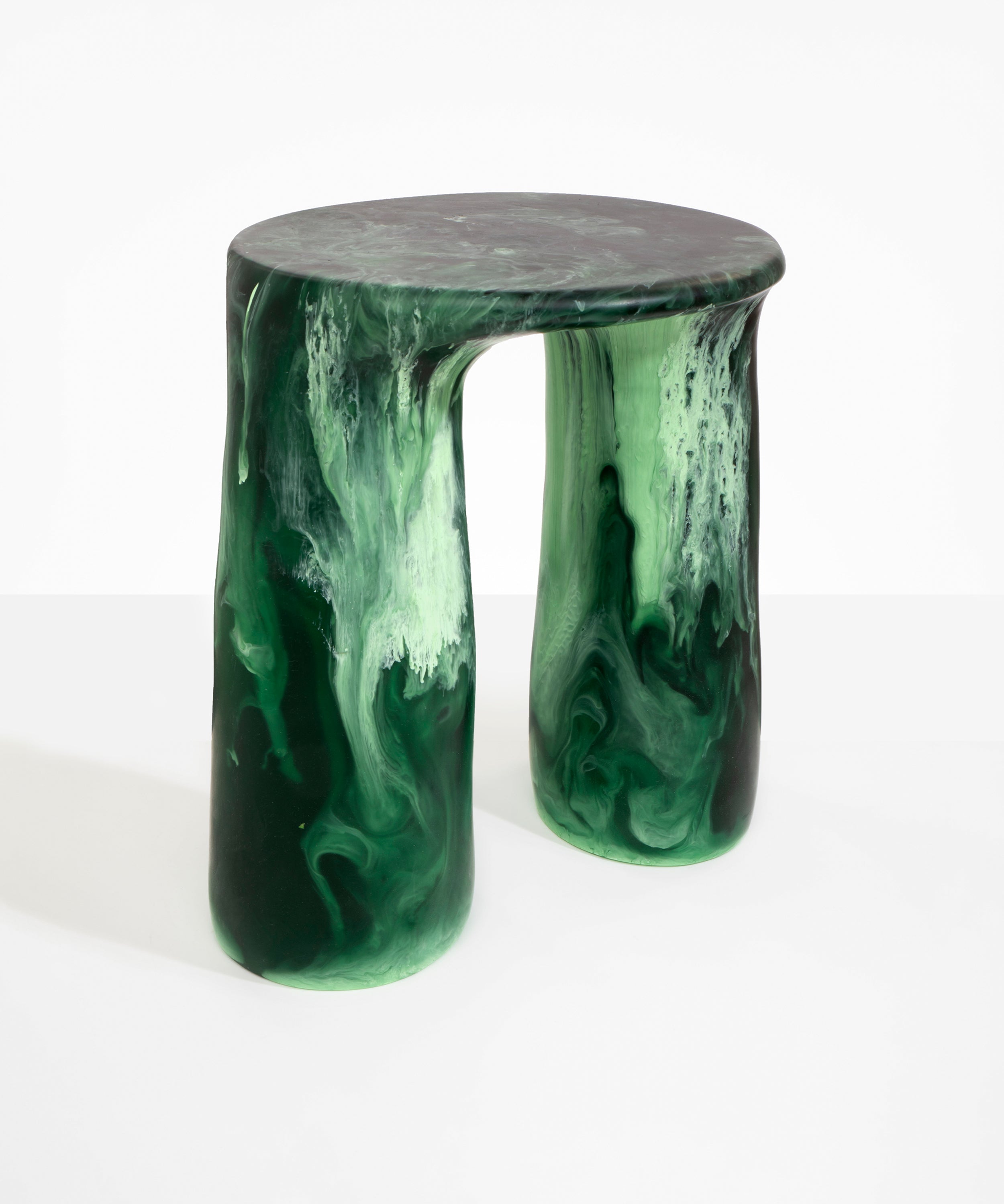 Dinosaur Designs Rock Tower Table in Moss — handcrafted marbled green resin side table with oval top and two chunky rounded legs