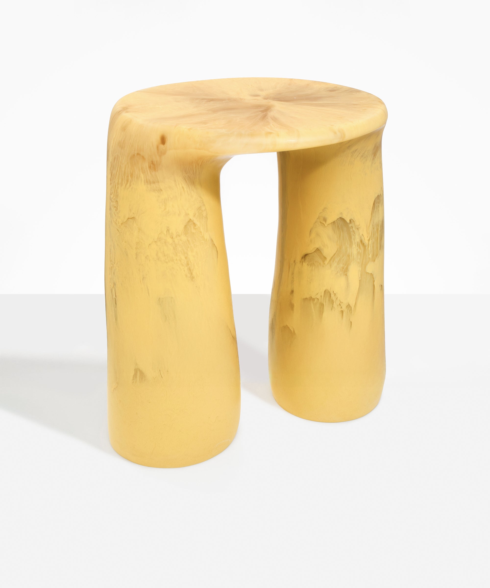 Dinosaur Designs Rock Tower Table in Pollen — handcrafted marbled yellow and clear resin side table with oval top and two chunky rounded legs