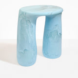 Dinosaur Designs Rock Tower Table in Pool — handcrafted marbled blue and clear resin side table with oval top and two chunky rounded legs