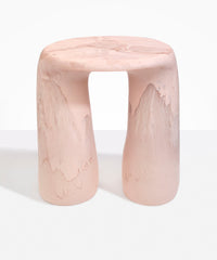 Dinosaur Designs Rock Tower Table in Rose Swirl — handcrafted marbled pink resin side table with oval top and chunky rounded legs..