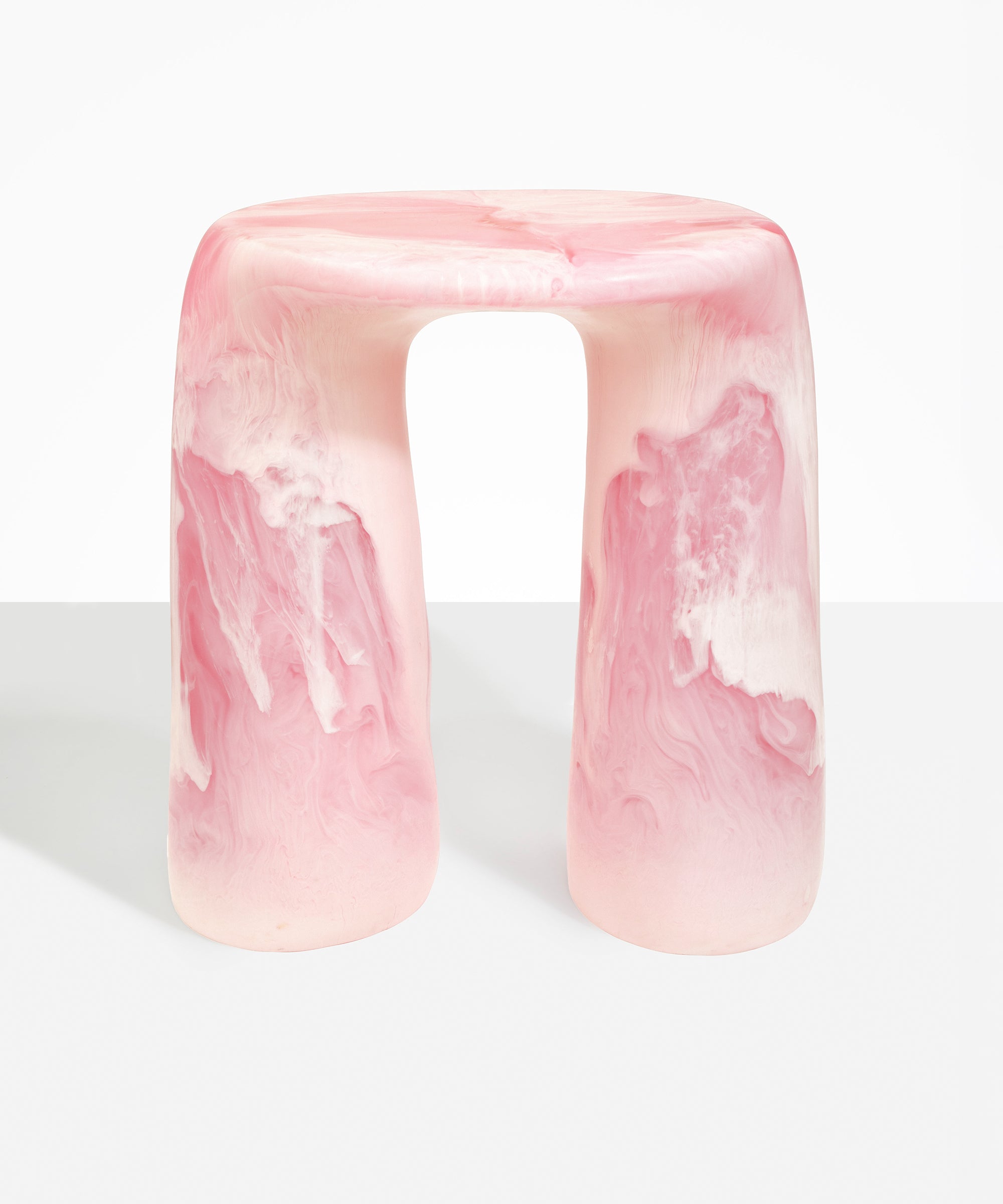 Dinosaur Designs Rock Tower Table in Shell Pink — handcrafted marbled pink resin side table with oval top and chunky rounded legs