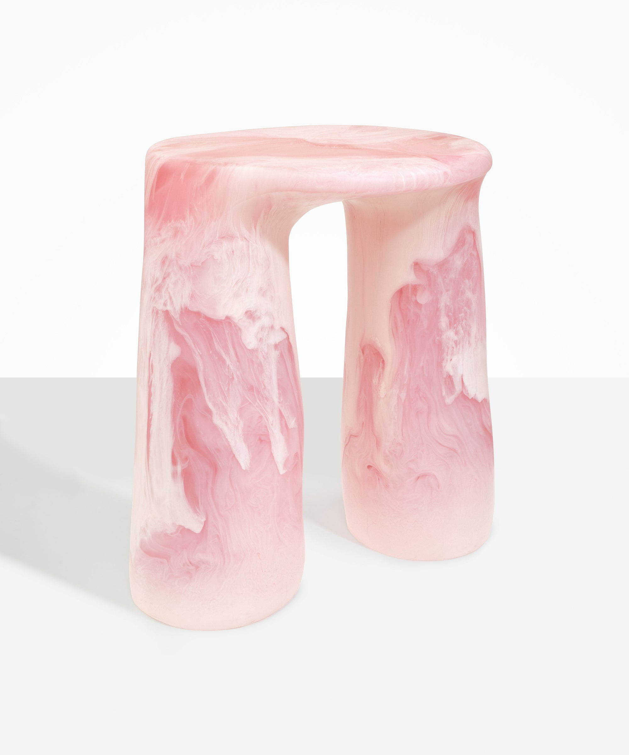 Dinosaur Designs Rock Tower Table in Shell Pink — handcrafted marbled pink resin side table with oval top and chunky rounded legs
