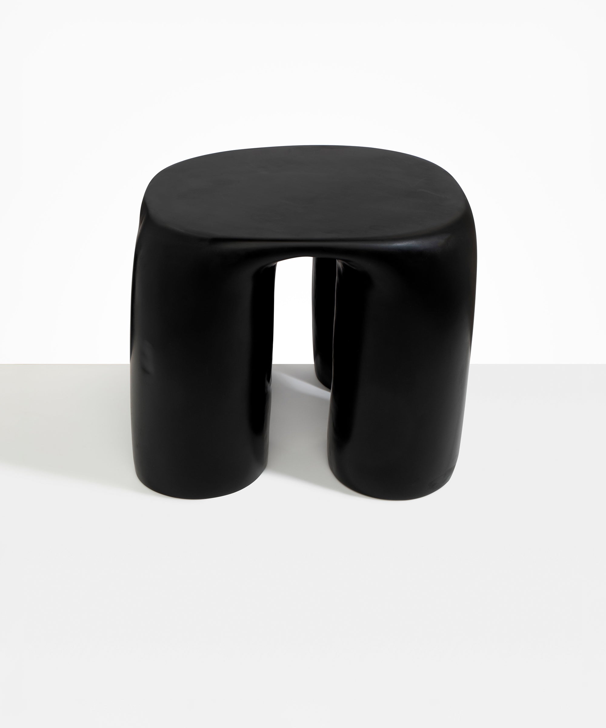 Dinosaur Designs 4-Leg Rock Tower Table in Black — handcrafted black resin side table with square top and four chunky rounded legs