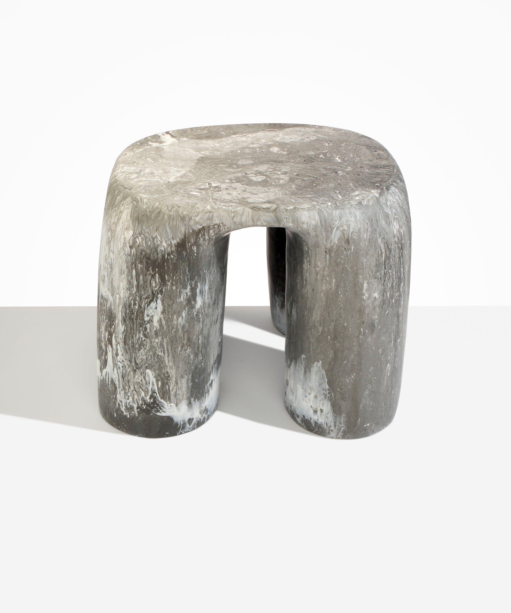 Dinosaur Designs 4-Leg Rock Tower Table in Granite — handcrafted marbled grey and white resin side table with square top and four chunky rounded legs..