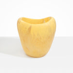 Dinosaur Designs Large Beetle Vase in Pollen — handcrafted marbled yellow resin vase with wide rounded body and sculpted open petal-shaped rim