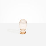 Dinosaur Designs Small Glass Rockpool Vase in Clear Brown — handblown transparent brown glass vase with rounded bulbous body and small spherical pedestal base..