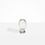Dinosaur Designs Small Glass Rockpool Vase in Clear — handblown transparent glass vase with rounded bulbous body and small spherical pedestal base..