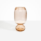 Dinosaur Designs Tall Glass Rockpool Vase in Clear Brown — handblown transparent brown glass vase with rounded bulbous body and spherical pedestal base..