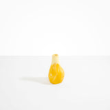 Dinosaur Designs medium sized Liquid vase in daisy yellow colour resin..