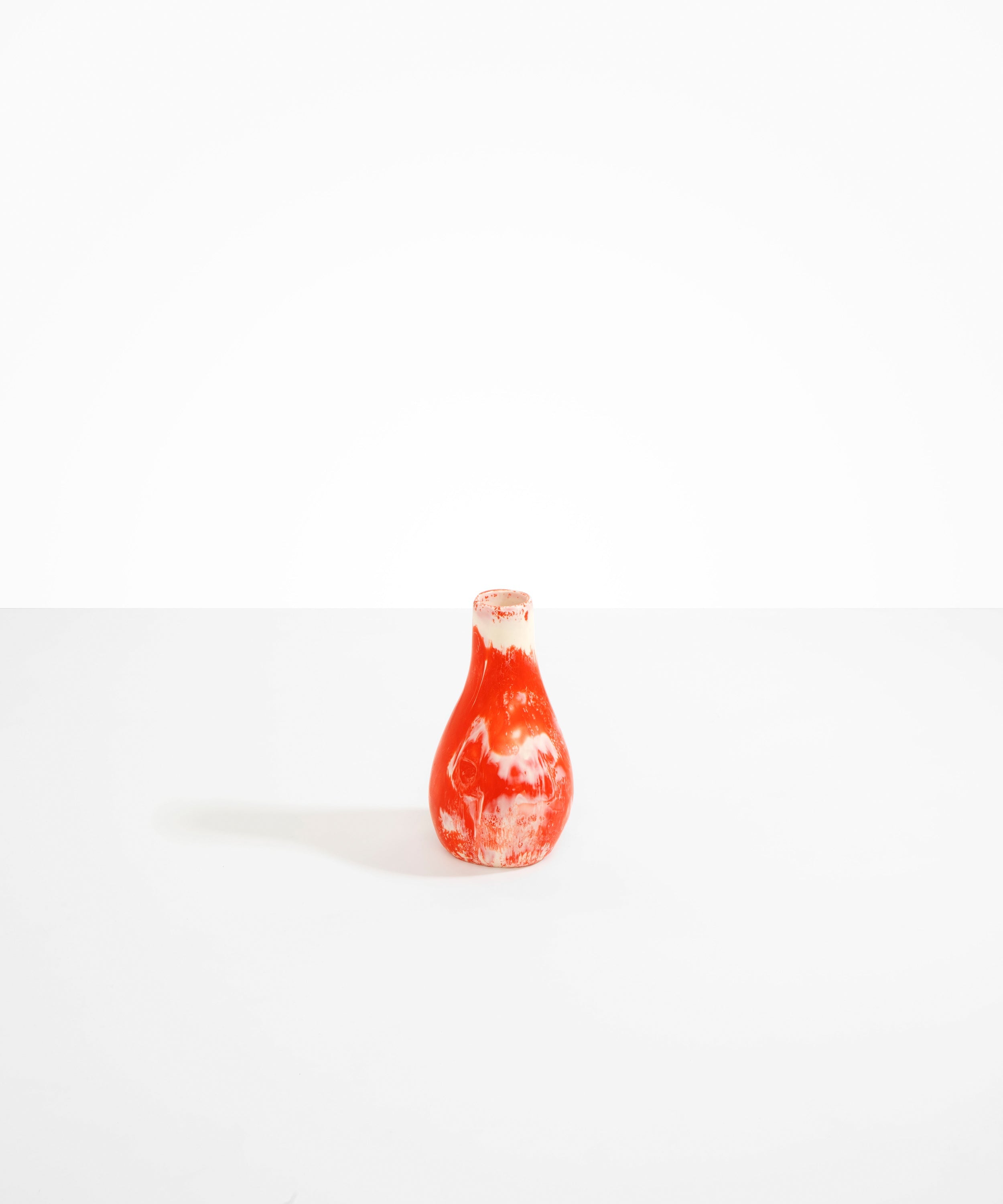 Dinosaur Designs Medium Liquid Vase in Strawberry Colour resin..
