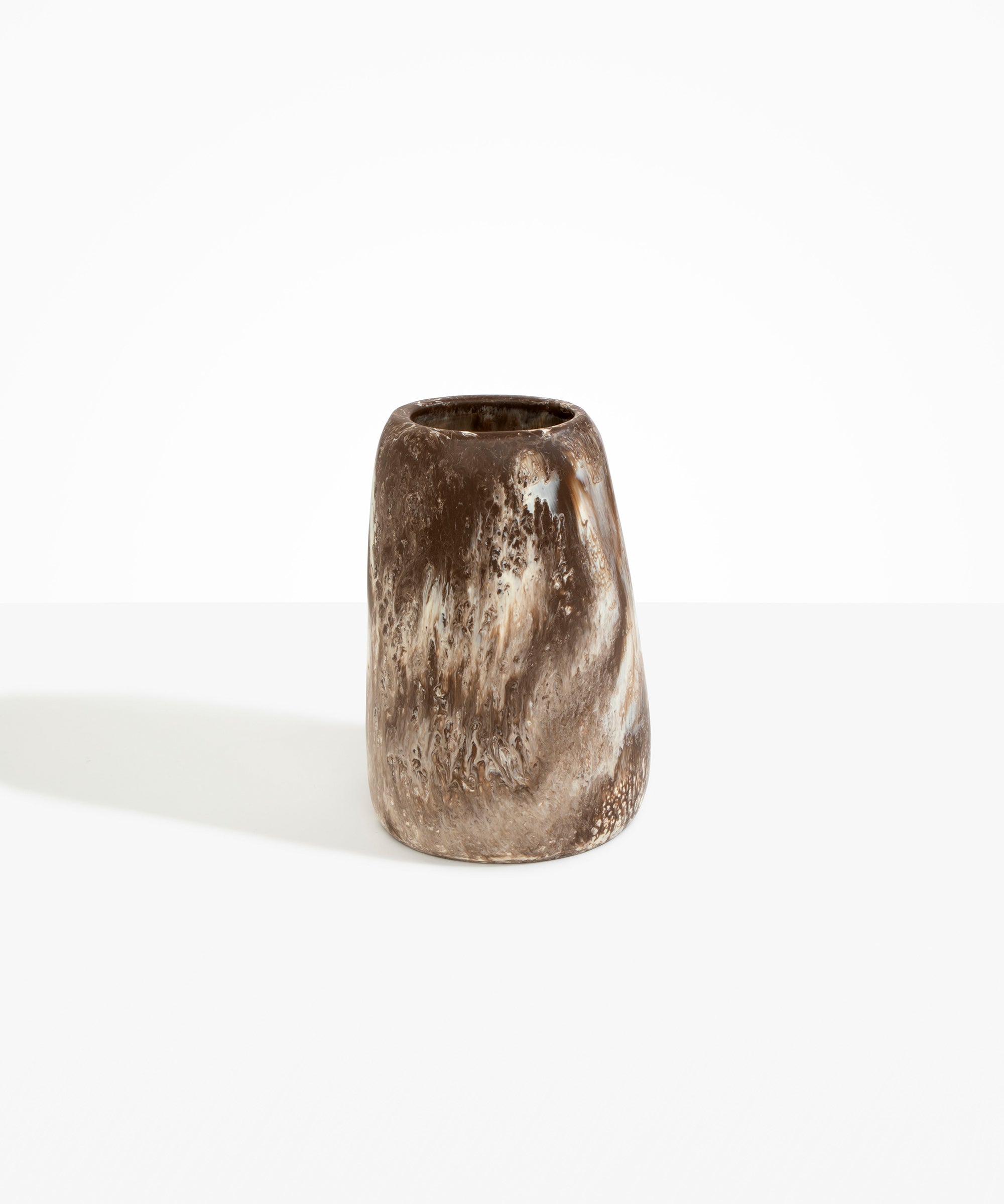 Dinosaur Designs Large Pebble Vase in Cappuccino — handcrafted marbled cream and brown resin vase with smooth rounded pebble form and narrow opening.