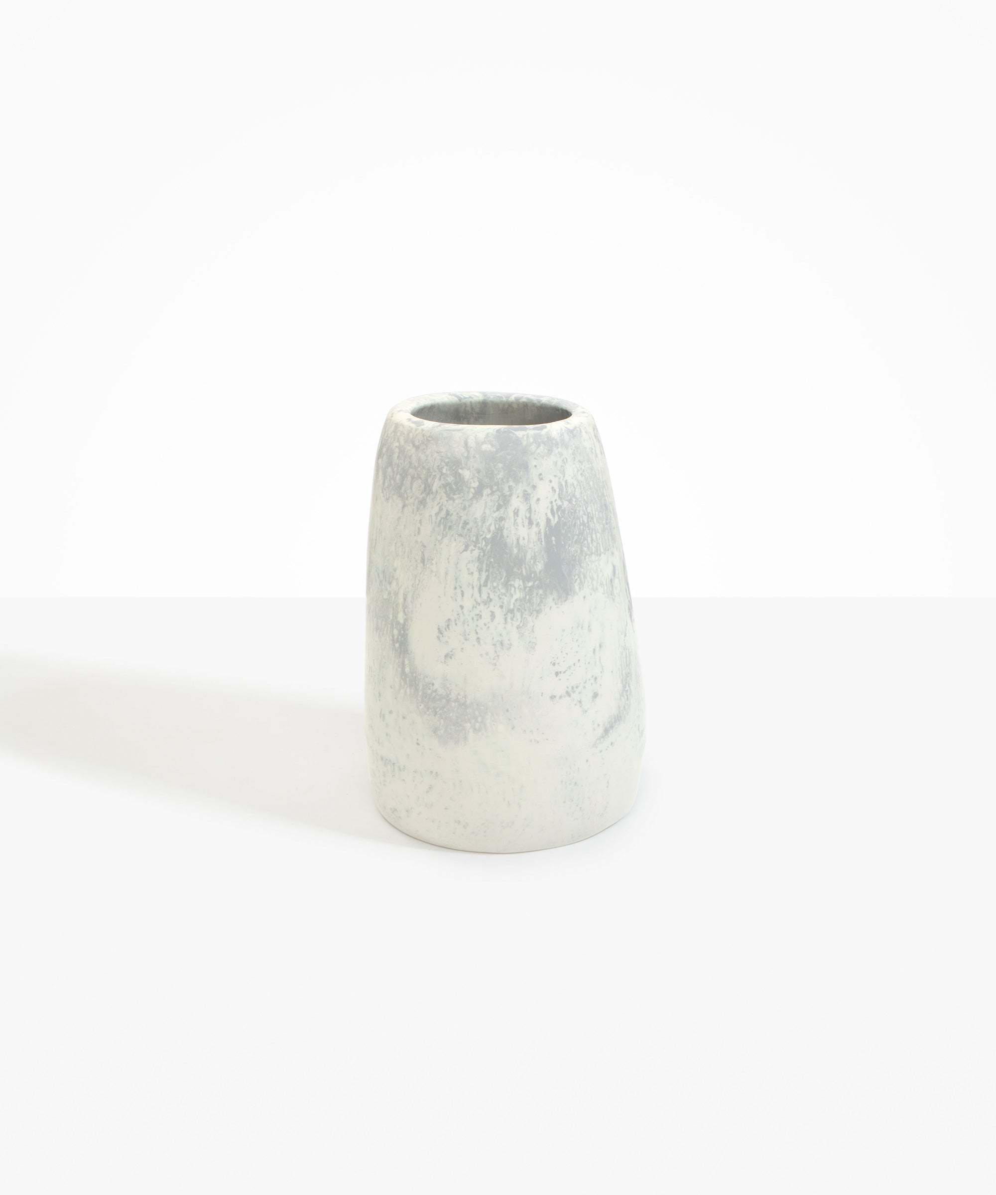 Dinosaur Designs Large Pebble Vase in Cloud — handcrafted marbled cream and grey resin vase with smooth rounded pebble form and narrow opening.