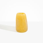 Dinosaur Designs Large Pebble Vase in Pollen — handcrafted marbled yellow and transparent resin vase with smooth rounded pebble form and narrow opening.