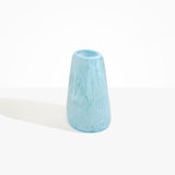 Dinosaur Designs Large Pebble Vase in Pool — handcrafted marbled blue and transparent resin vase with smooth rounded pebble form and narrow opening.