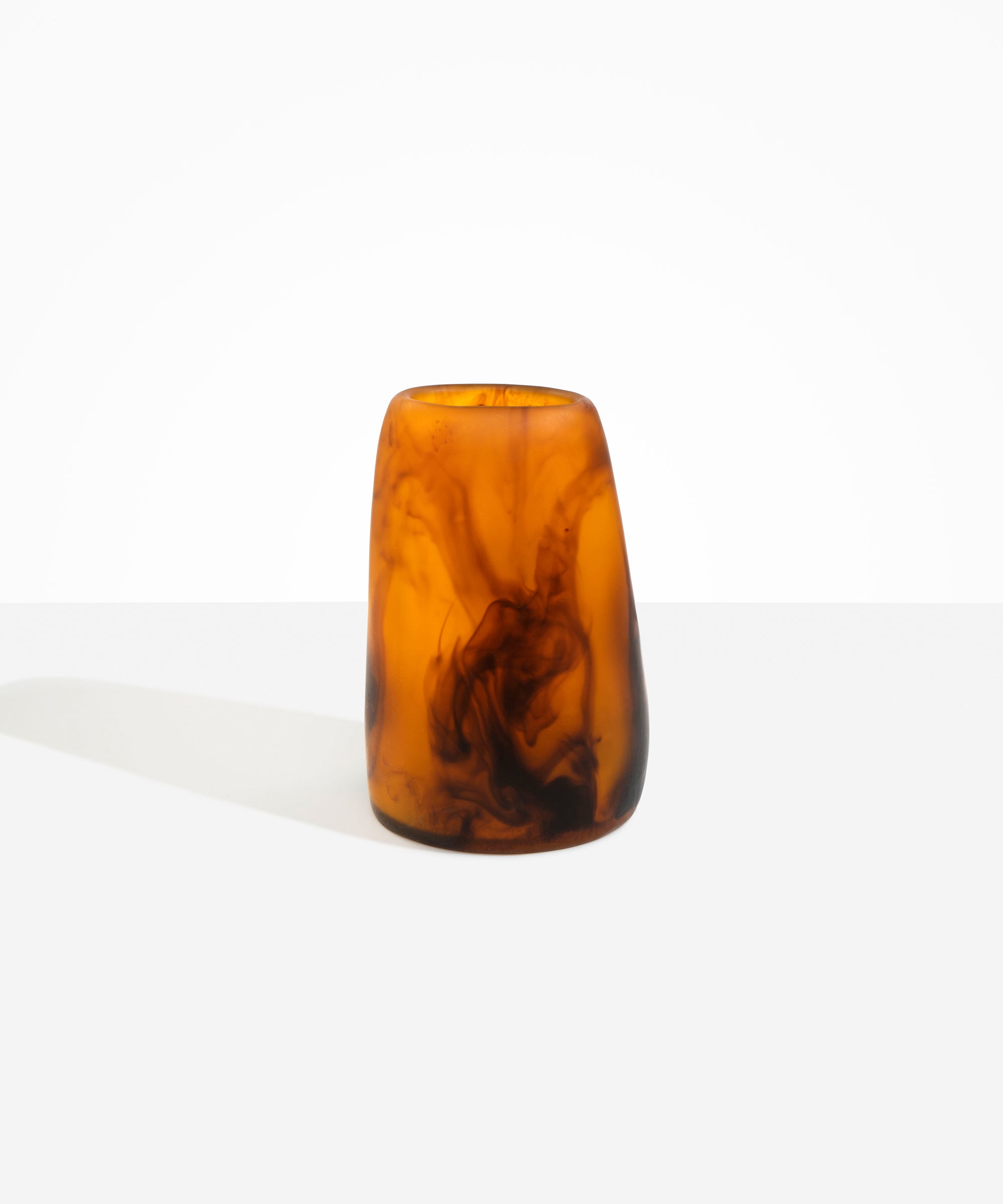 Dinosaur Designs Large Pebble Vase in Tortoise — handcrafted marbled amber and black resin vase with smooth rounded pebble form and narrow opening