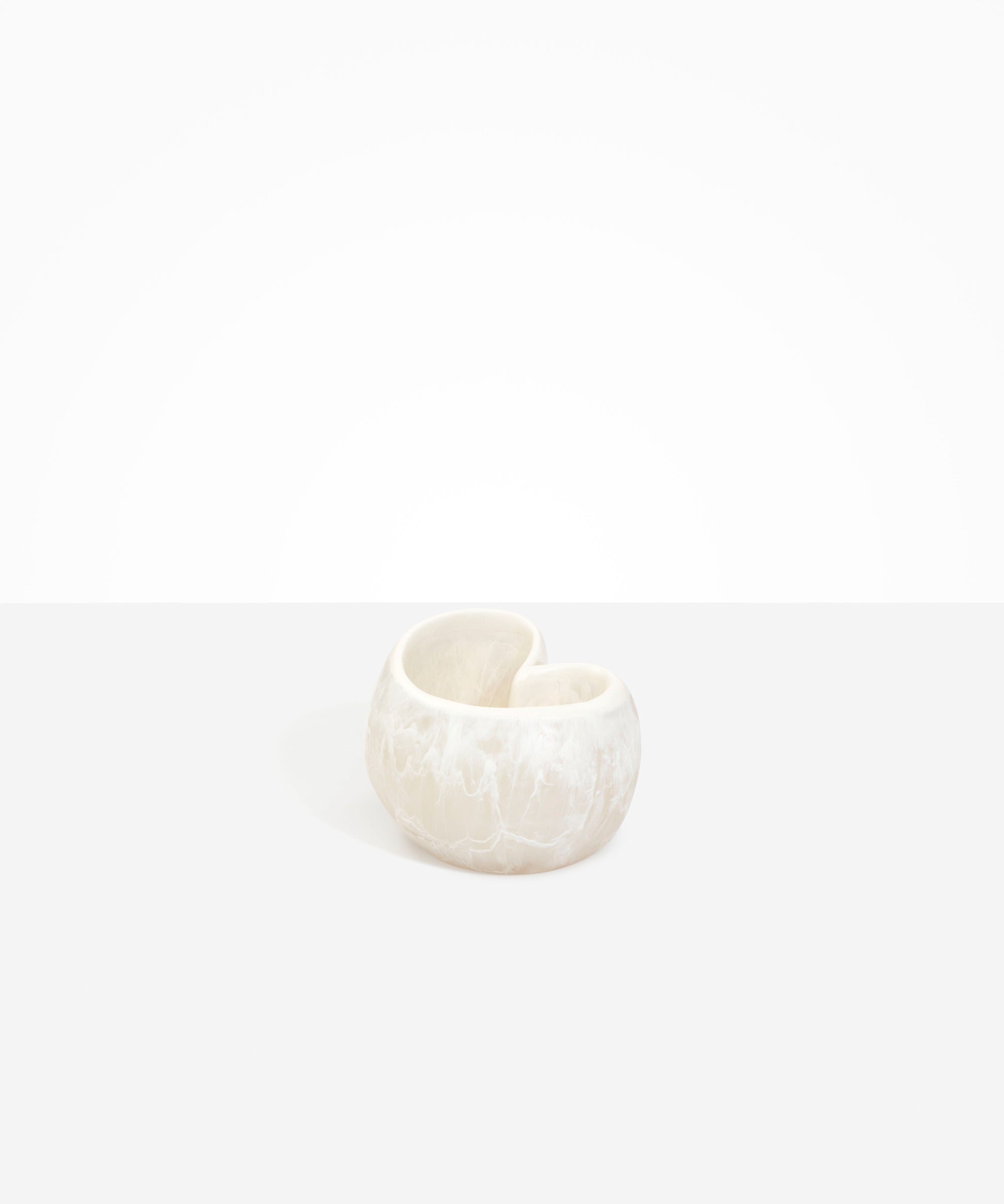 Dinosaur Designs Orchid Vase in Chalk Swirl — handcrafted marbled off-white resin vase with short rounded organic form and sculpted open petal-shaped rim