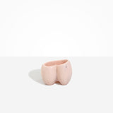 Dinosaur Designs Orchid Vase in Rose Swirl — handcrafted marbled dusty pink resin vase with short rounded organic form and sculpted open petal-shaped rim