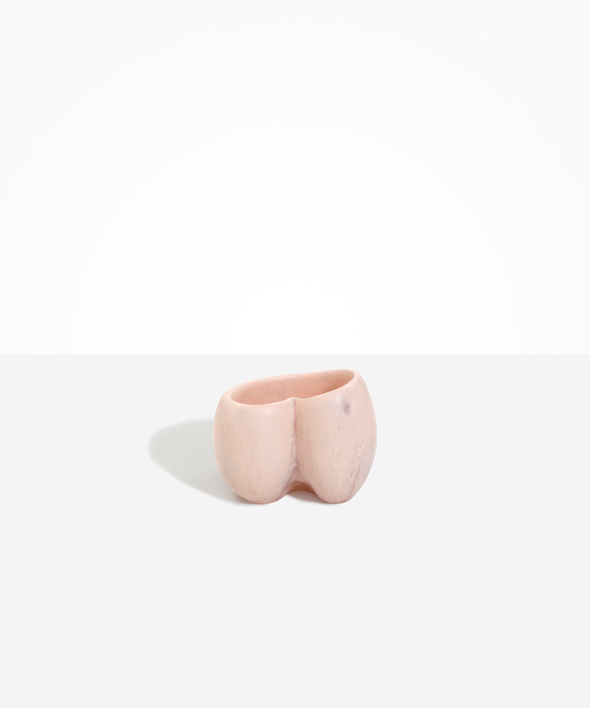 Dinosaur Designs Orchid Vase in Rose Swirl — handcrafted marbled dusty pink resin vase with short rounded organic form and sculpted open petal-shaped rim