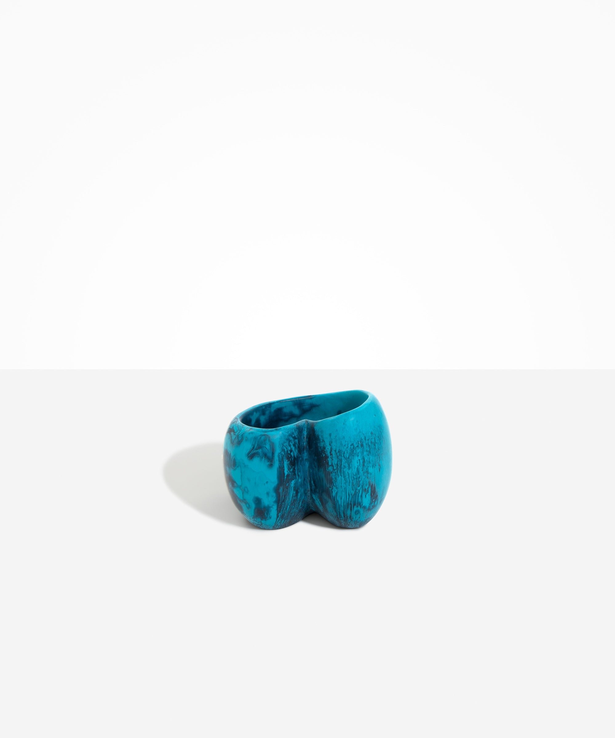 Dinosaur Designs Orchid Vase in Turquoise — handcrafted marbled teal blue resin vase with short rounded organic form and sculpted open petal-shaped rim