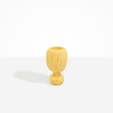 Dinosaur Designs Small Rockpool Vase in Pollen — handcrafted marbled yellow resin vase with rounded bulbous body and small spherical pedestal base