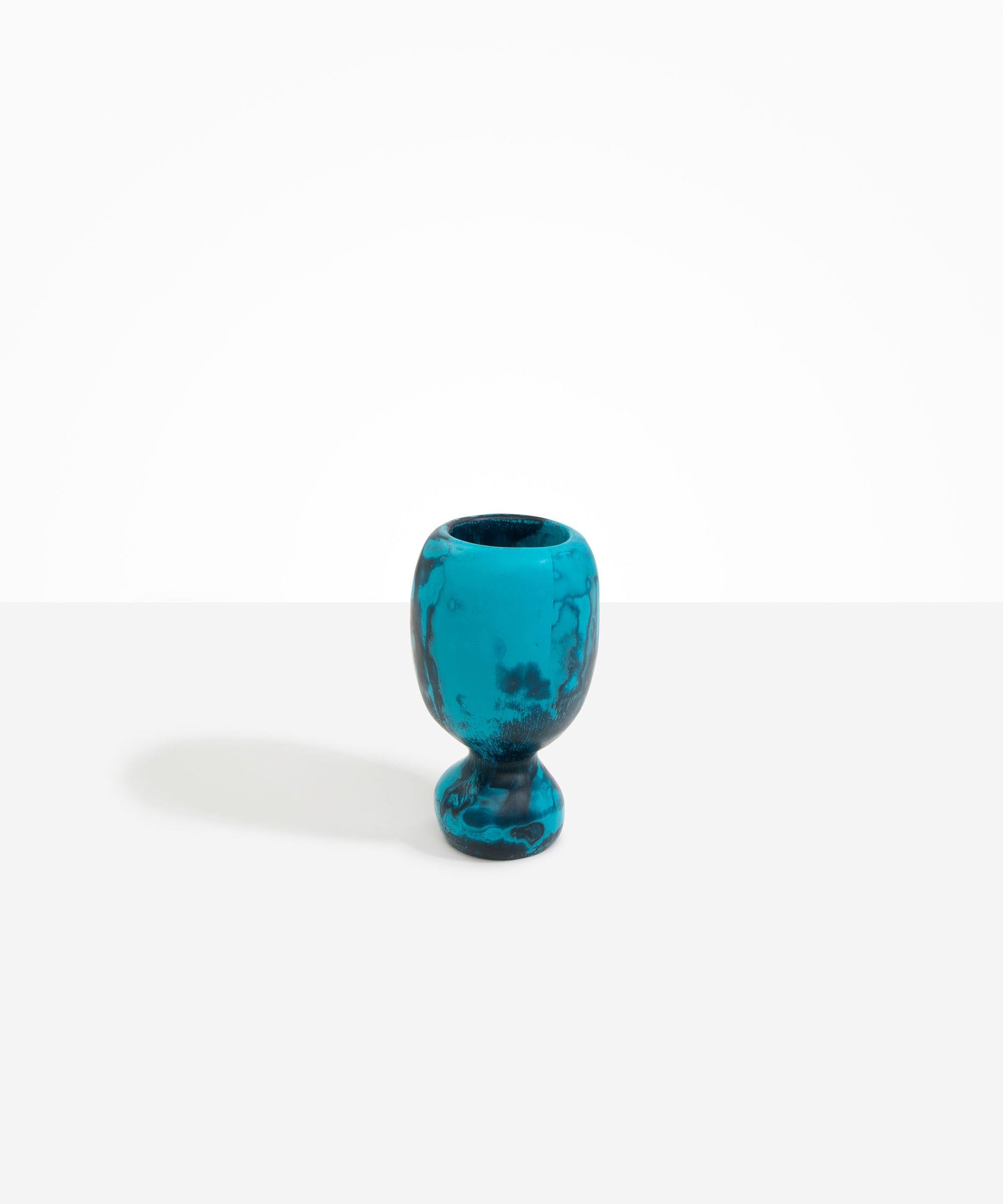 Dinosaur Designs Small Rockpool Vase in Turquoise — handcrafted marbled teal blue resin vase with rounded bulbous body and small spherical pedestal base