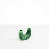 Dinosaur Designs Mini Branch Vase in Moss —  marbled green resin decorative vase with chunky U-shaped arch form and twin openings