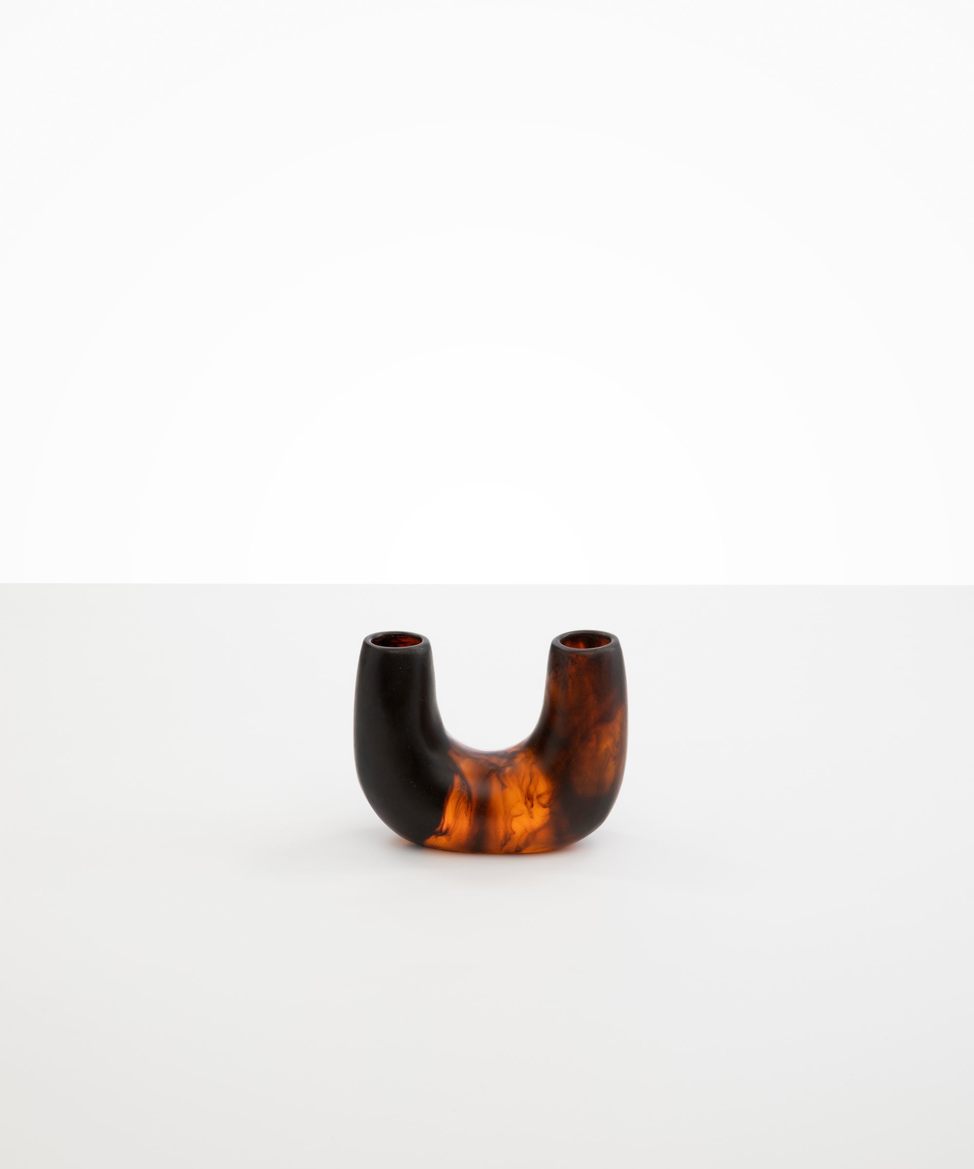 Dinosaur Designs Mini Branch Vase in Tortoise —  marbled black and brown resin decorative vase with chunky U-shaped arch form and twin openings