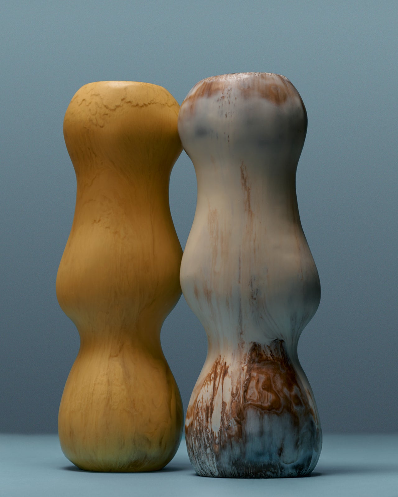 Curved yellow and brown tall vases