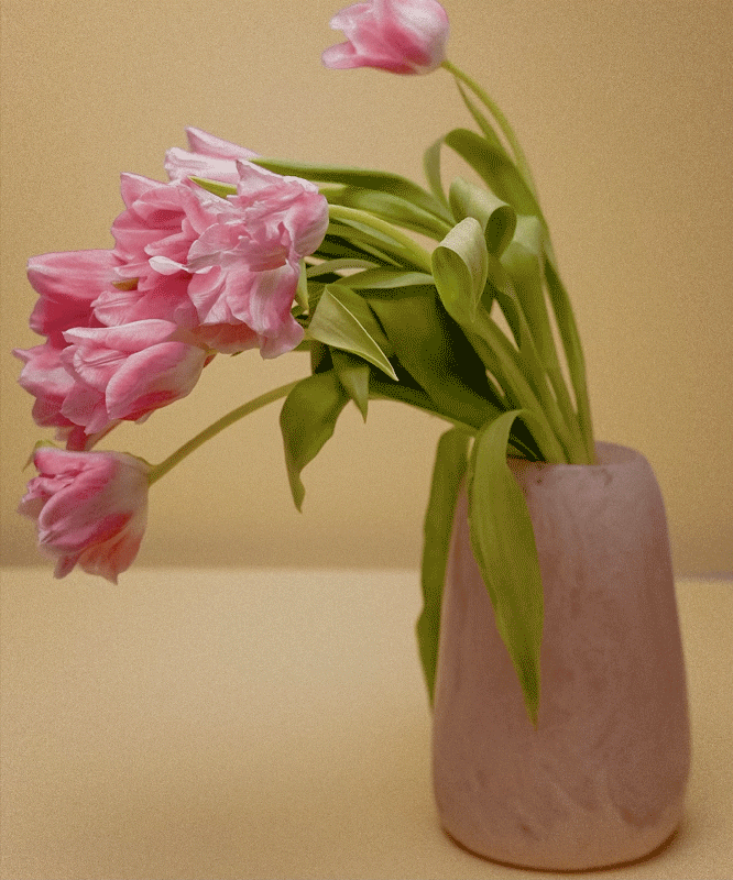 Large pink vase with flowers