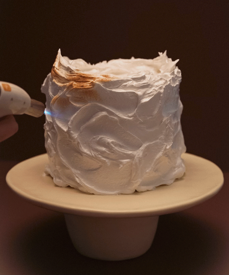 Cream cake stand with cake