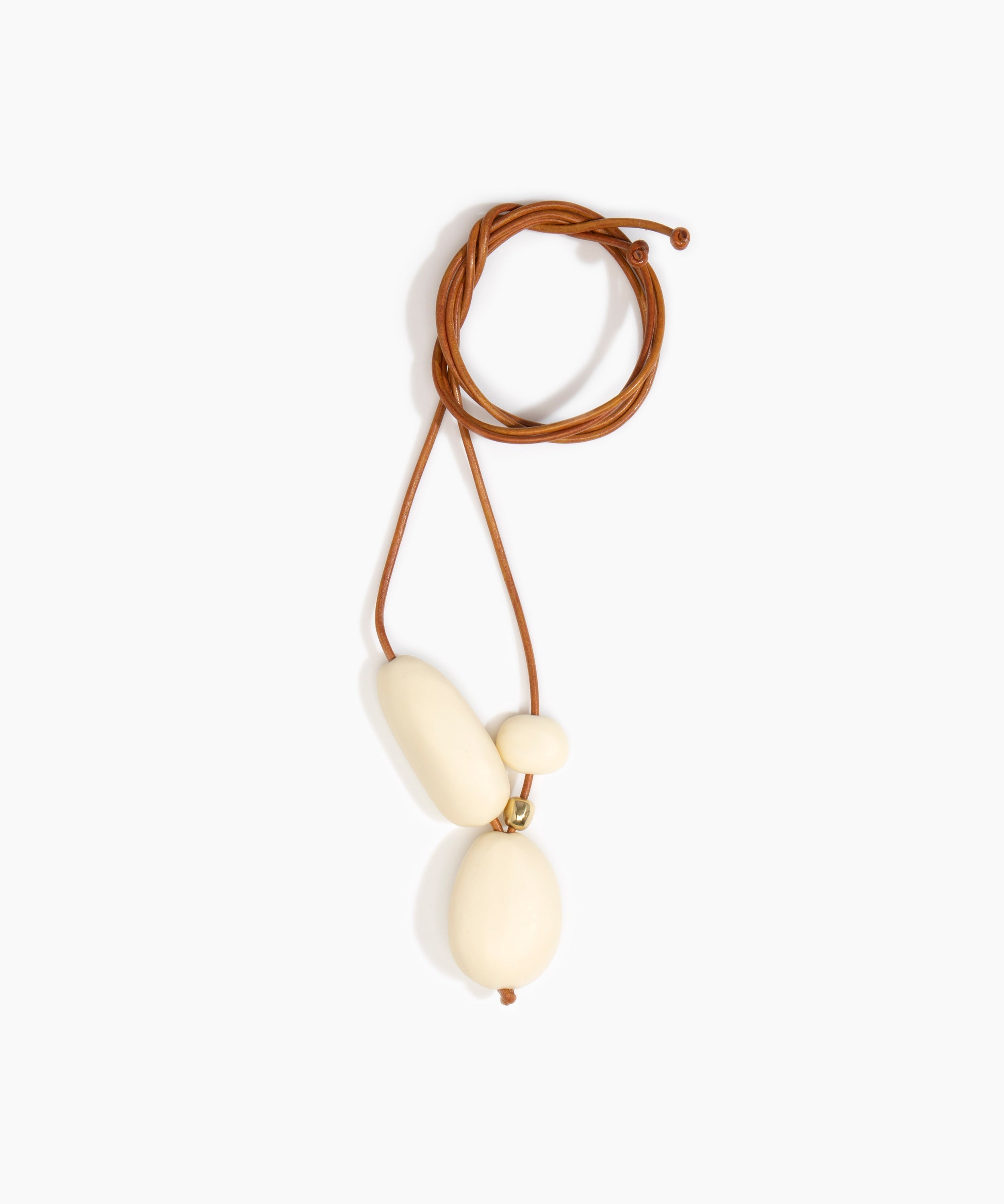 Dinosaur Designs Rock Cluster Pendant Necklaces in Cream Colour resin with Nano-Coated Brass Bead Material