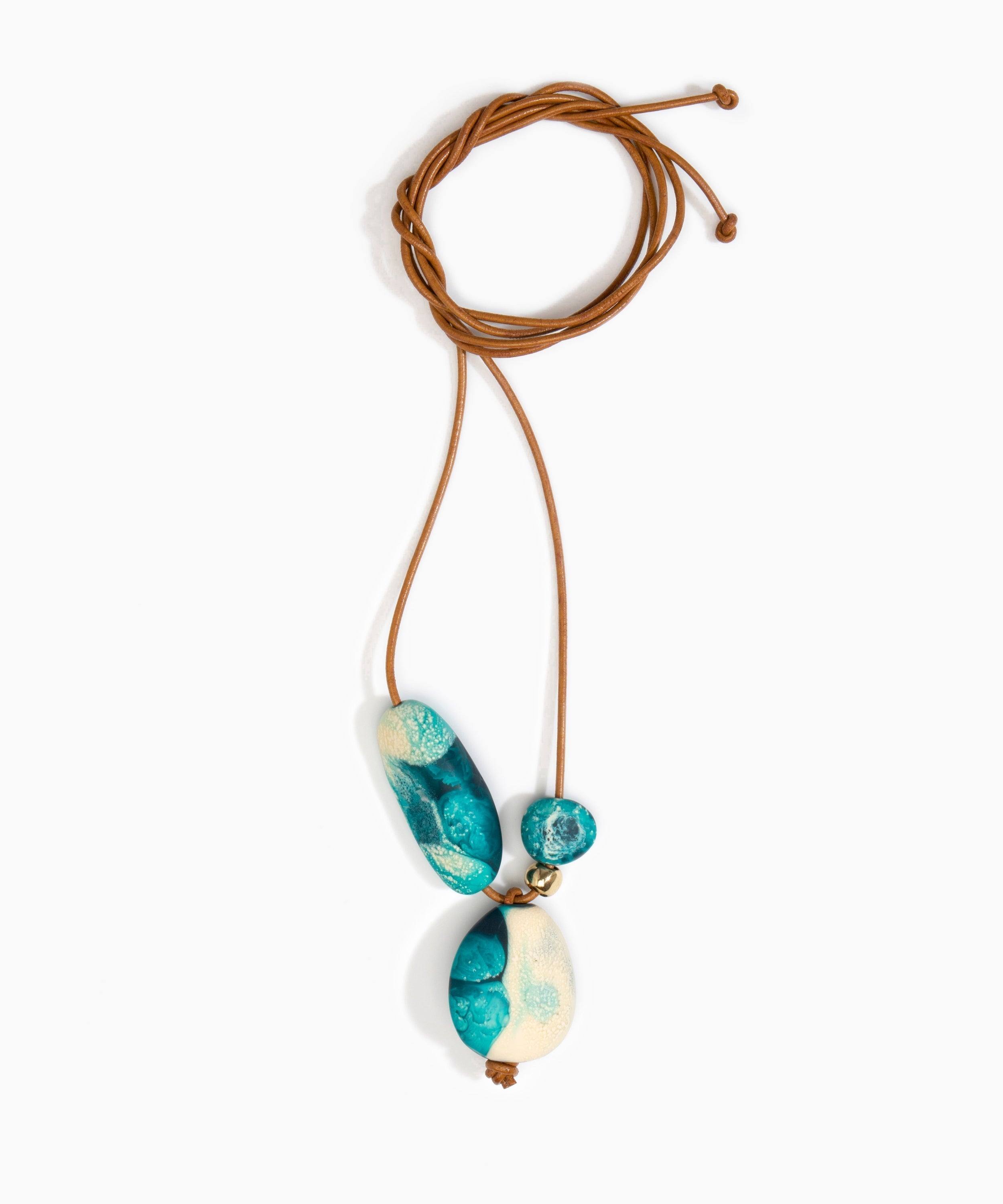 Dinosaur Designs Rock Cluster Pendant in Lagoon Colour resin with Nano-Coated Brass Bead Material.