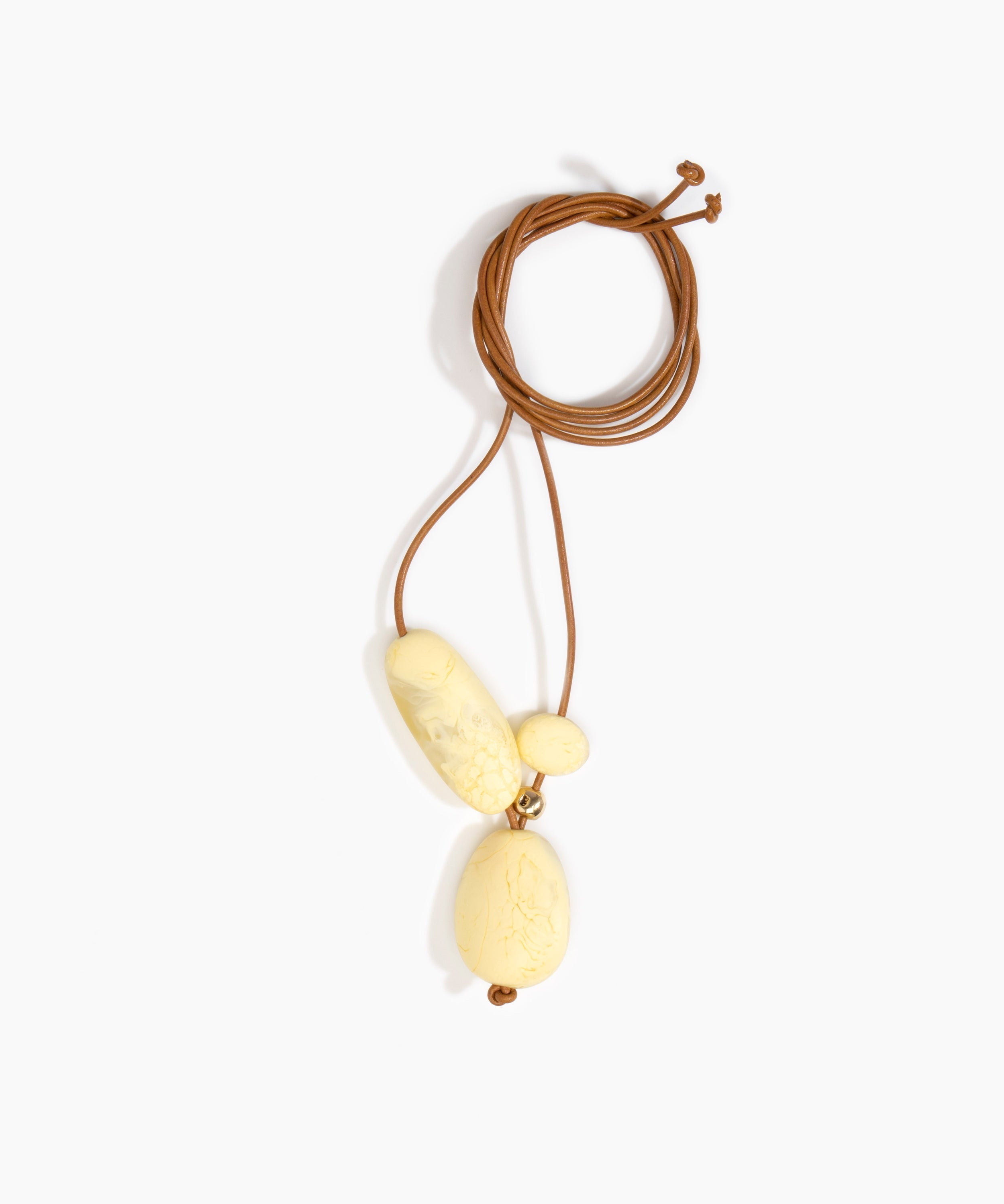 Dinosaur Designs Rock Cluster Pendant in Lemon Colour resin with Nano-Coated Brass Bead Material.
