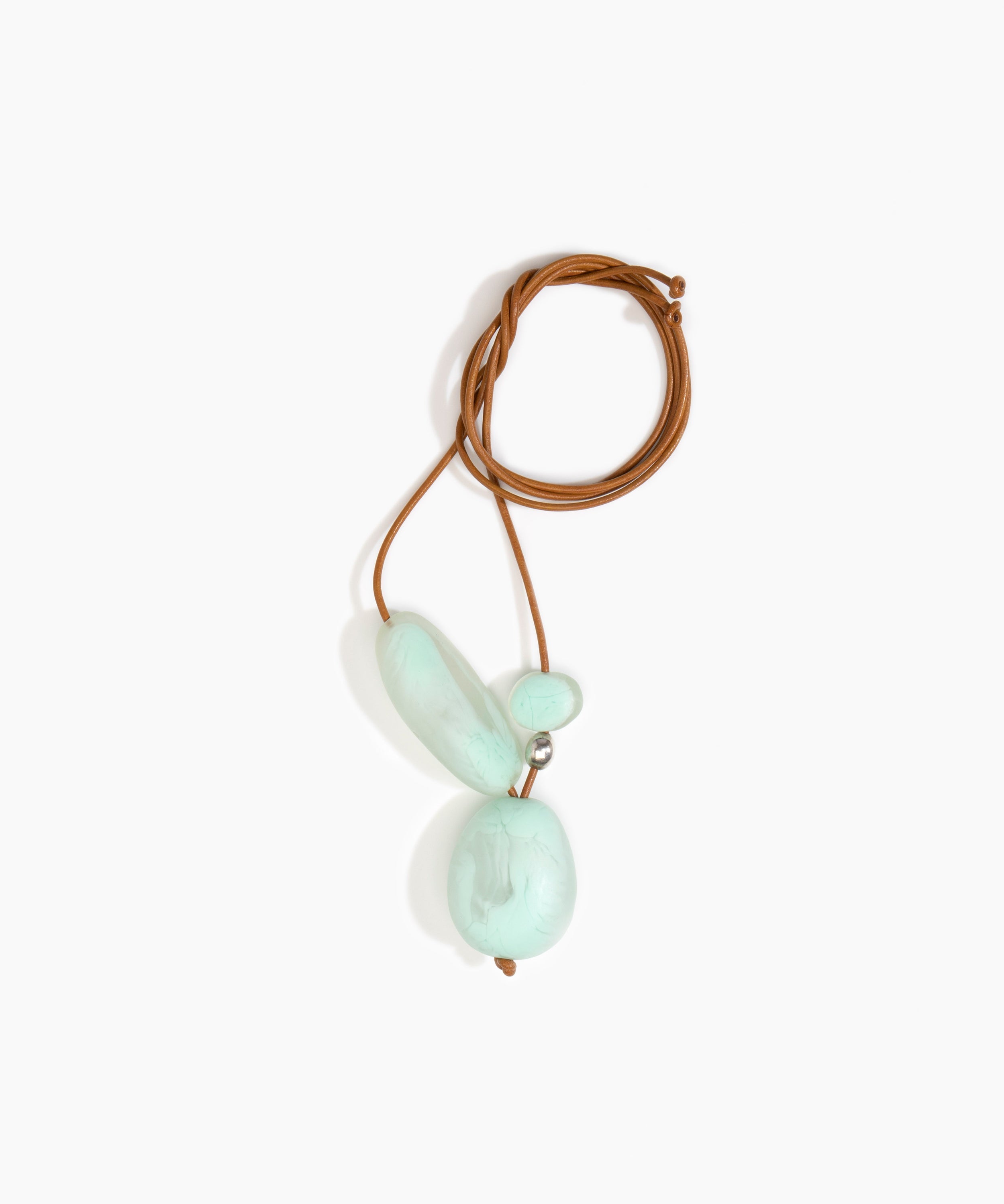 Dinosaur Designs Rock Cluster Pendant in Mint Colour resin with Nano-Coated Brass Bead Material.